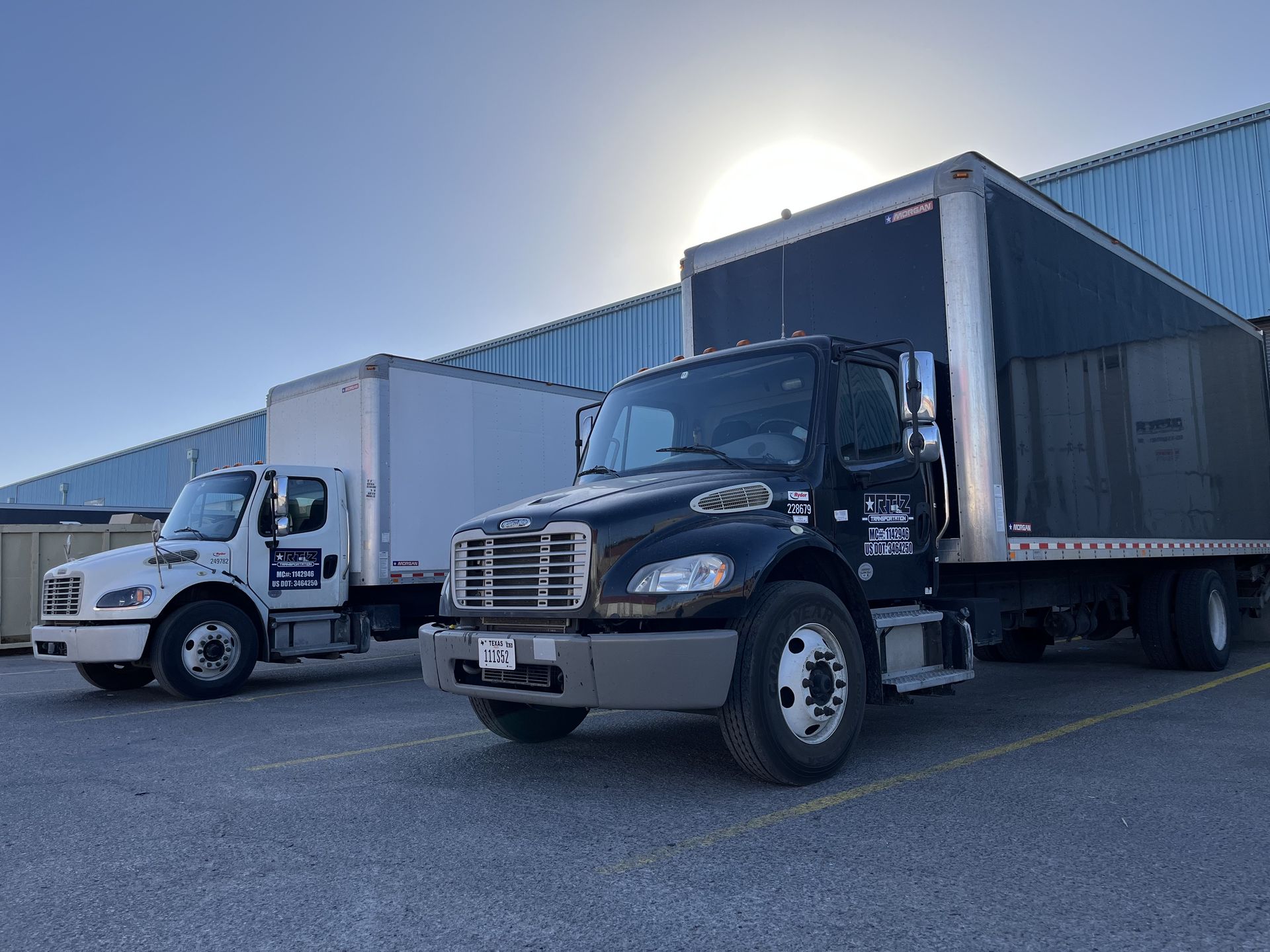 Ortiz Transportation box trucks at the loading yard