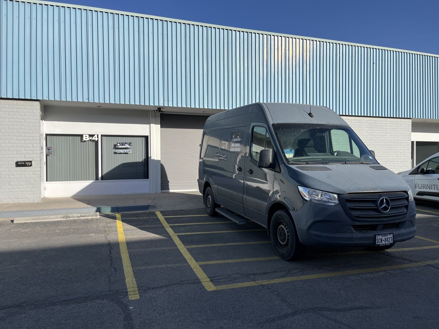 Ortiz Transportation delivery van outside our Lomaland Dr. facility